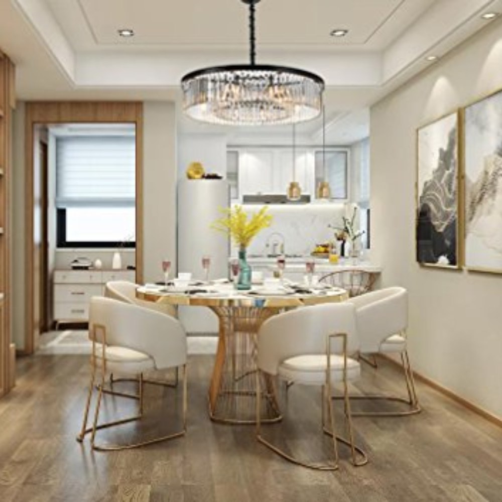 A crystal chandelier above a softly lit dining table